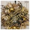 Gold, Christmas-themed wreath.