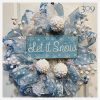 Blue and white, winter-themed wreath.